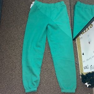 green aritzia tna sweatpants